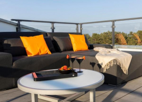 Penthouse am Südstrand - Dachterrasse mit Meerblick, Gasgrill, Klimaanlage, Luxus-Design-Apartment, 30 m zum Strand